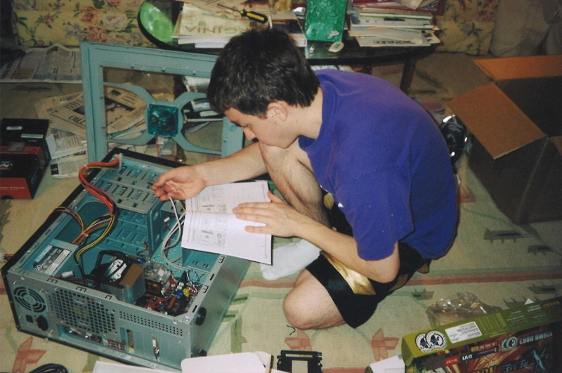 Colin Applegate fixing a computer
